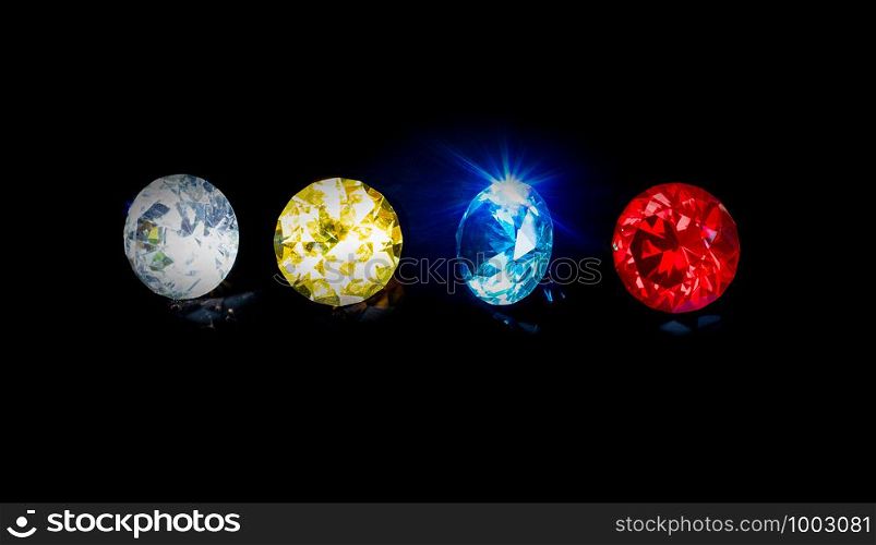 Group beautiful diamond at blue red yellow and clear on isolated black background