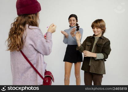 group children playing with soap bubbles