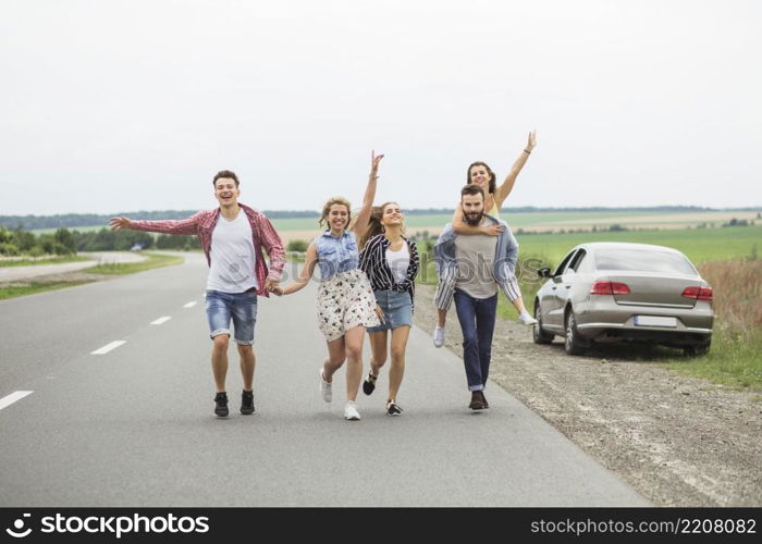 group friends enjoying road