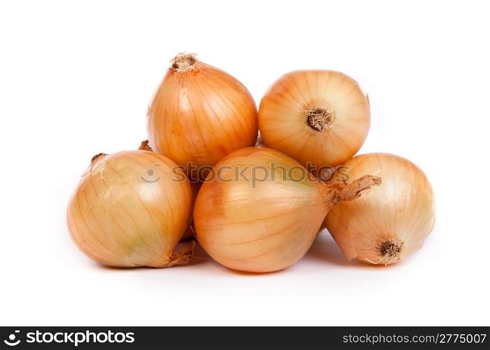 Group of a onions, isolated against white background