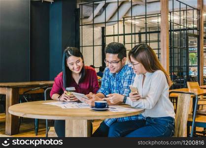 Group Of Asian Business people with casual suit brainstorm in relax action In the modern coffee shop, business group concept
