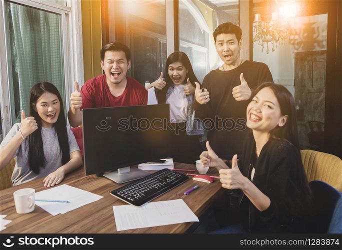 group of asian younger freelancing team work happiness emotion in home office