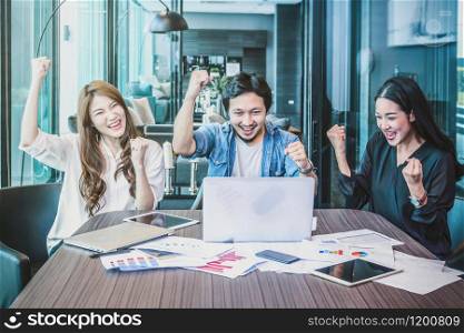 Group Of AsianBusiness people with casual suit working with happy action and celebrate in the modern Office, people business group concept