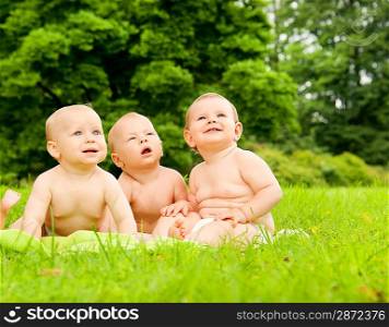 Group of babies outdoors.