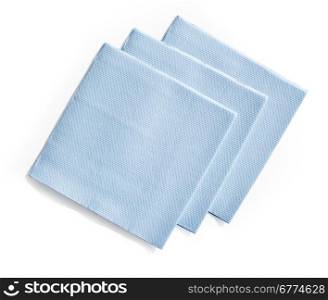 Group of blue paper napkins isolated on white background with clipping path