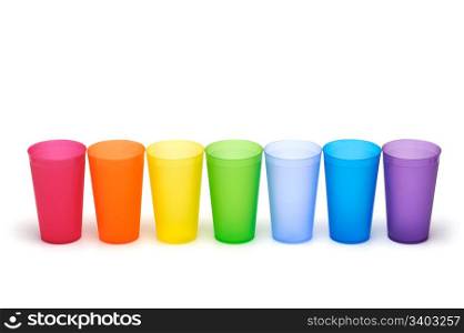 Group of bright plastic cups. Group of bright plastic cups, rainbow colors, white background