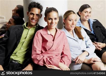 Group of business executives sitting together