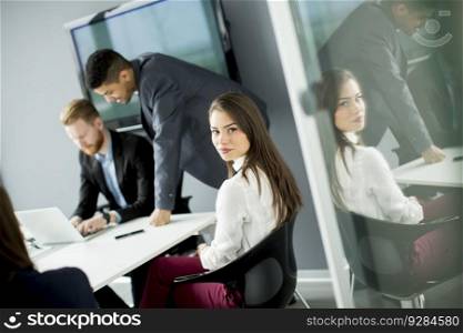 Group of business people at a meeting  in modern office