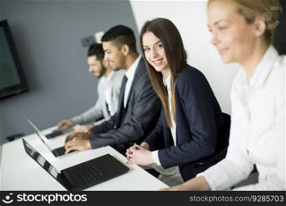 Group of business people at a meeting  in modern office
