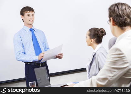 Group of business people brainstorming together in the meeting room. Business team meeting