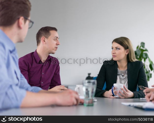 Group of business people discussing business plan in the office