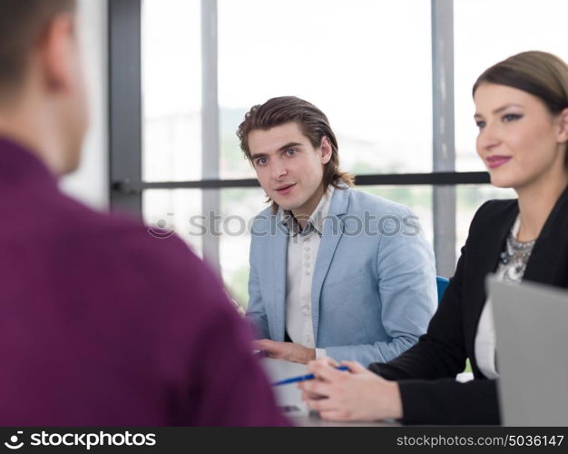 Group of business people discussing business plan in the office