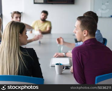 Group of business people discussing business plan in the office