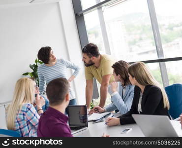 Group of business people discussing business plan in the office