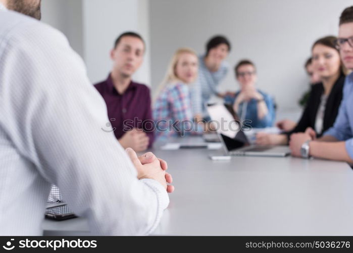 Group of business people discussing business plan in the office