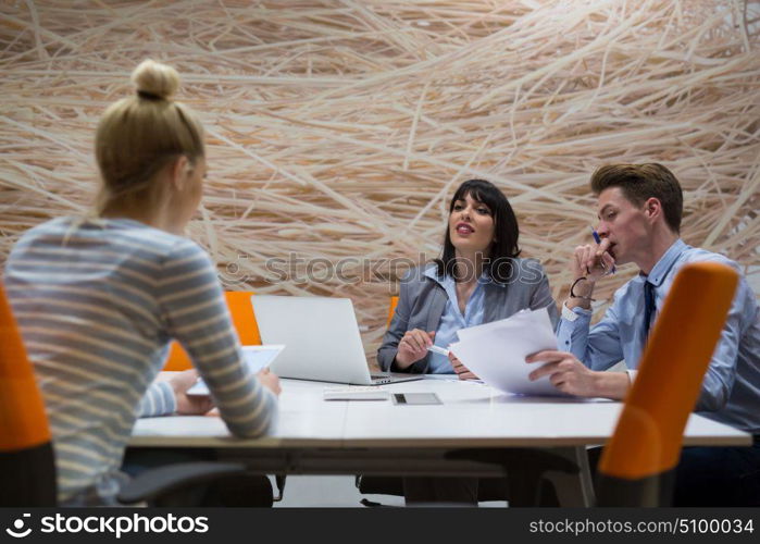 Group of business people discussing business plan in the office