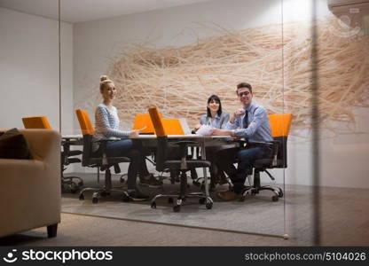 Group of business people discussing business plan in the office