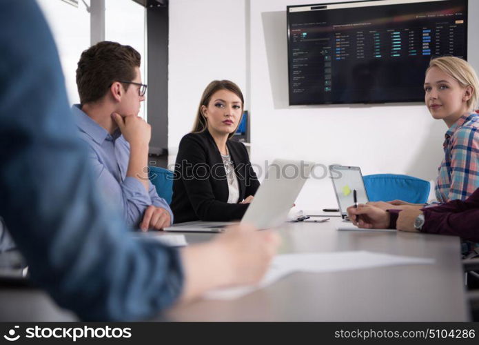 Group of business people discussing business plan in the office