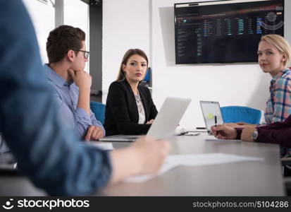 Group of business people discussing business plan in the office