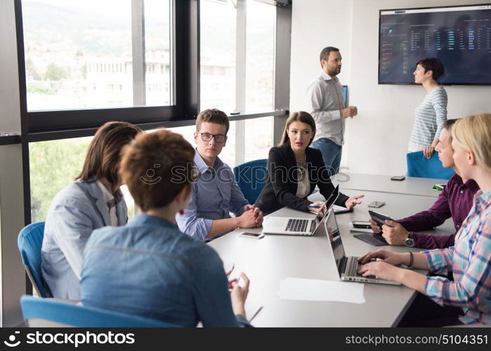 Group of business people discussing business plan in the office