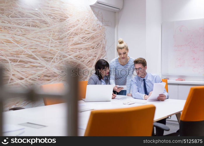 Group of business people discussing business plan in the office