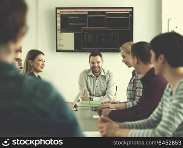 Group of business people discussing business plan in the office