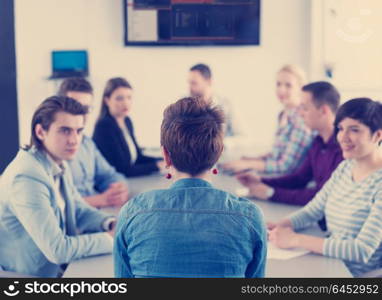 Group of business people discussing business plan in the office