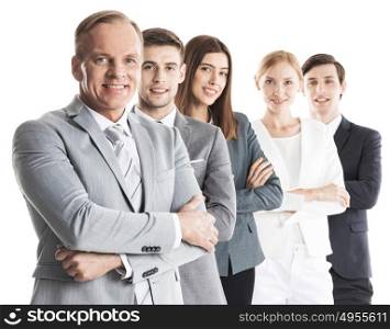 Group of business people. Group of confident smiling business people standing together in a row with crossed hands, isolated on white background