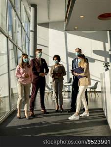 Group of business people meeting and working in the office and wear mask for protect prevent infection by corona virus