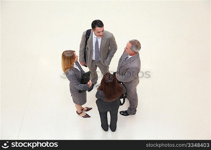 Group of business people meeting in hall