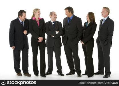 Group Of Business People Standing Around Conversing