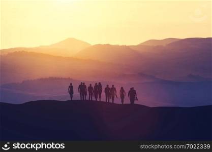 Group of business people standing on a hill during the sunset. Corporation. 3D illustration.. Group of business people standing on a hill