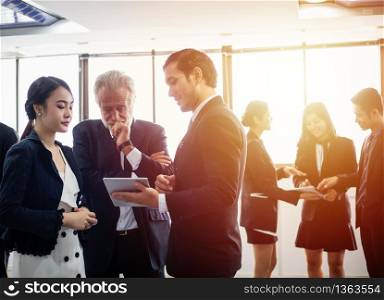 Group of Business People using tablet for Meeting Discussion Working Concept in meeting room