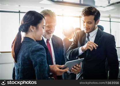 Group of Business People using tablet for Meeting Discussion Working Concept in meeting room