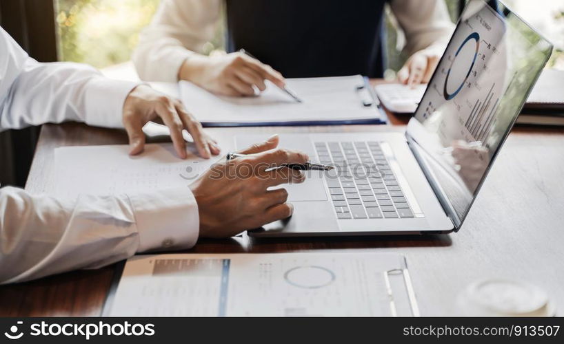 Group of Business people working on marketing project in conference room.