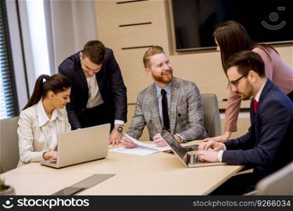 Group of business people working together in the modern office
