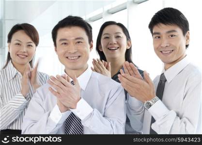 Group of Businesspeople Clapping