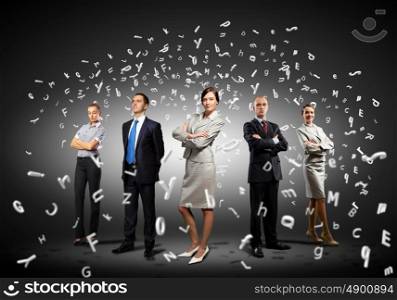 Group of businesspeople. Image of businesspeople standing against world map background