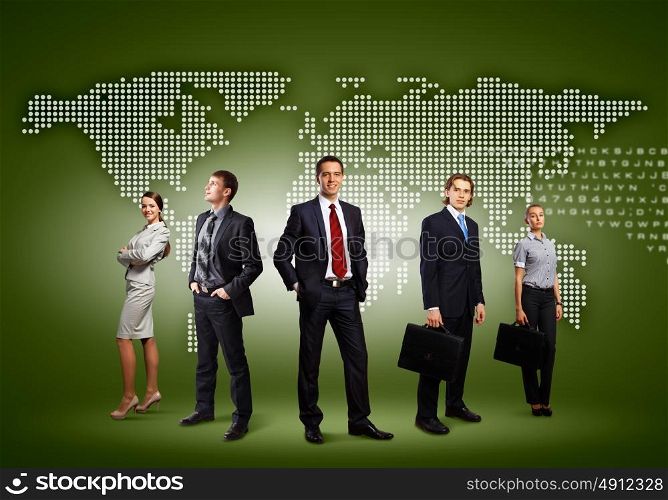 Group of businesspeople. Image of businesspeople standing against world map background