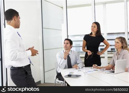 Group Of Businesspeople Meeting In Office