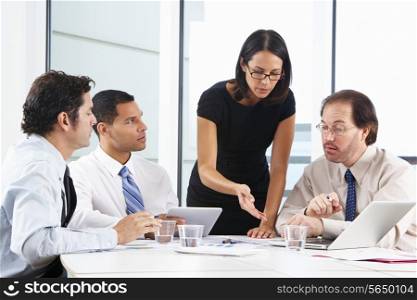 Group Of Businesspeople Meeting In Office