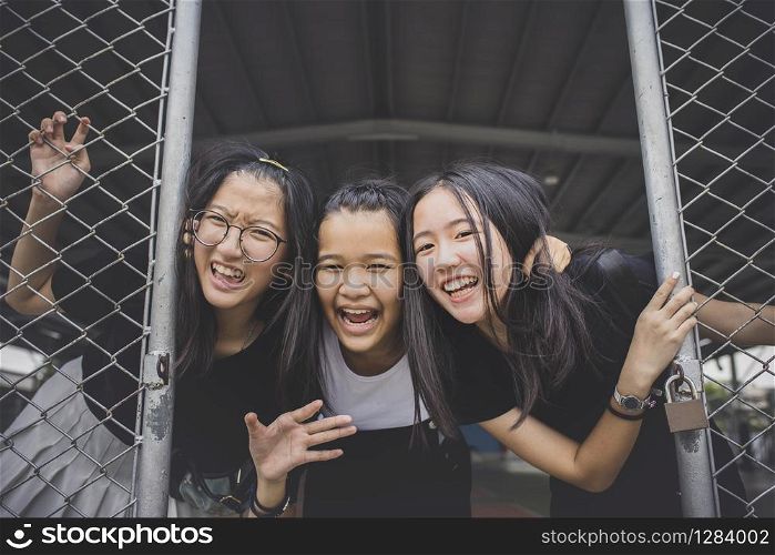 group of cheerful asian teenager happiness emotion in school sport gymnaseum