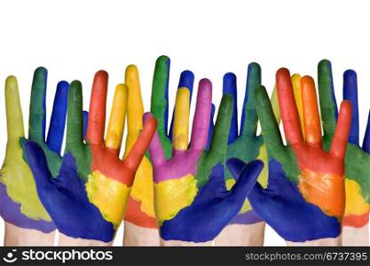 group of child hands painted in colorful paints