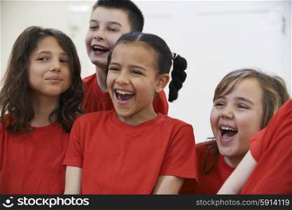 Group Of Children Enjoying Drama Class Together