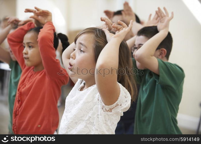 Group Of Children Enjoying Drama Class Together