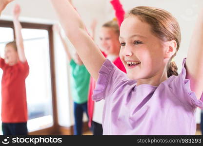 Group Of Children Enjoying Drama Class Together