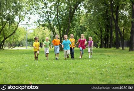 Group of children having fun together in the park