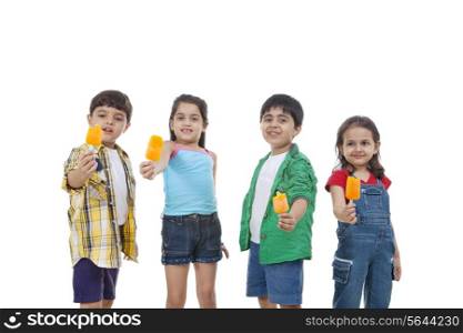 Group of children holding flavored ice