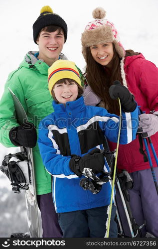 Group Of Children On Ski Holiday In Mountains