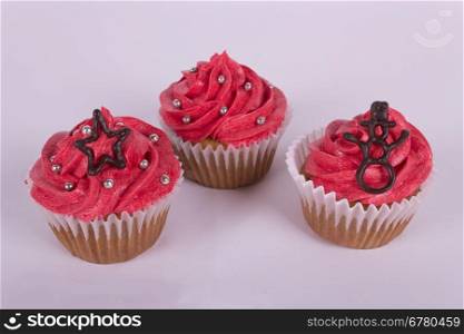 Group of Christmas cupcakes on white background